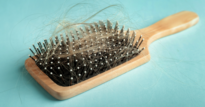 Hair brush with hair loss.